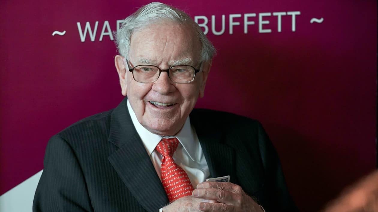 FILE - In this May 5, 2019, file photo, Warren Buffett, Chairman and CEO of Berkshire Hathaway, smiles as he plays bridge following the annual Berkshire Hathaway shareholders meeting in Omaha, Neb. Buffett's company made two new investments during the third quarter while trimming its holdings in several drugmakers and financial firms, the company announced Monday, Nov. 15, 2021. (AP Photo/Nati Harnik, File)