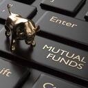Why prefer investing in ETFs over mutual funds in an investment portfolio?