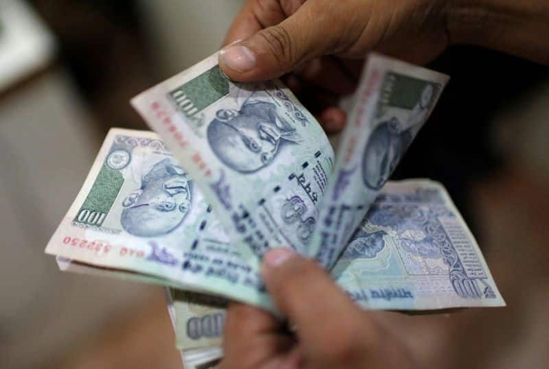 The rupee slumped 22 paise to close at 76.16 (provisional) against the US dollar on Friday as investors assessed the global economic impact of the Russia-Ukraine conflict amid rising crude oil prices.