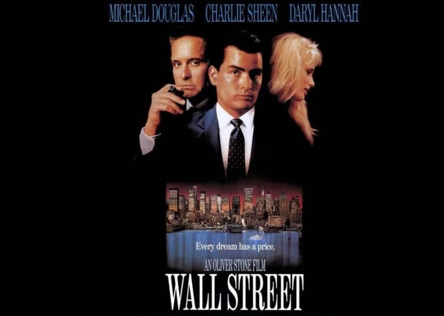 Wall Street is a 1987 American drama film, directed and co-written by Oliver Stone, starring Michael Douglas, Charlie Sheen, Daryl Hannah, and Martin Sheen. The film revolves around a young stockbroker, Bud Fox (Charlie Sheen) who wants to work with his hero Gordon Gekko (Michael Douglas), a wealthy, ruthless corporate raider and ultimately gets involved in stock market manipulation and insider trading. It is hands down one of the best stock market movies which rightly showcases the greed associated with wall street.