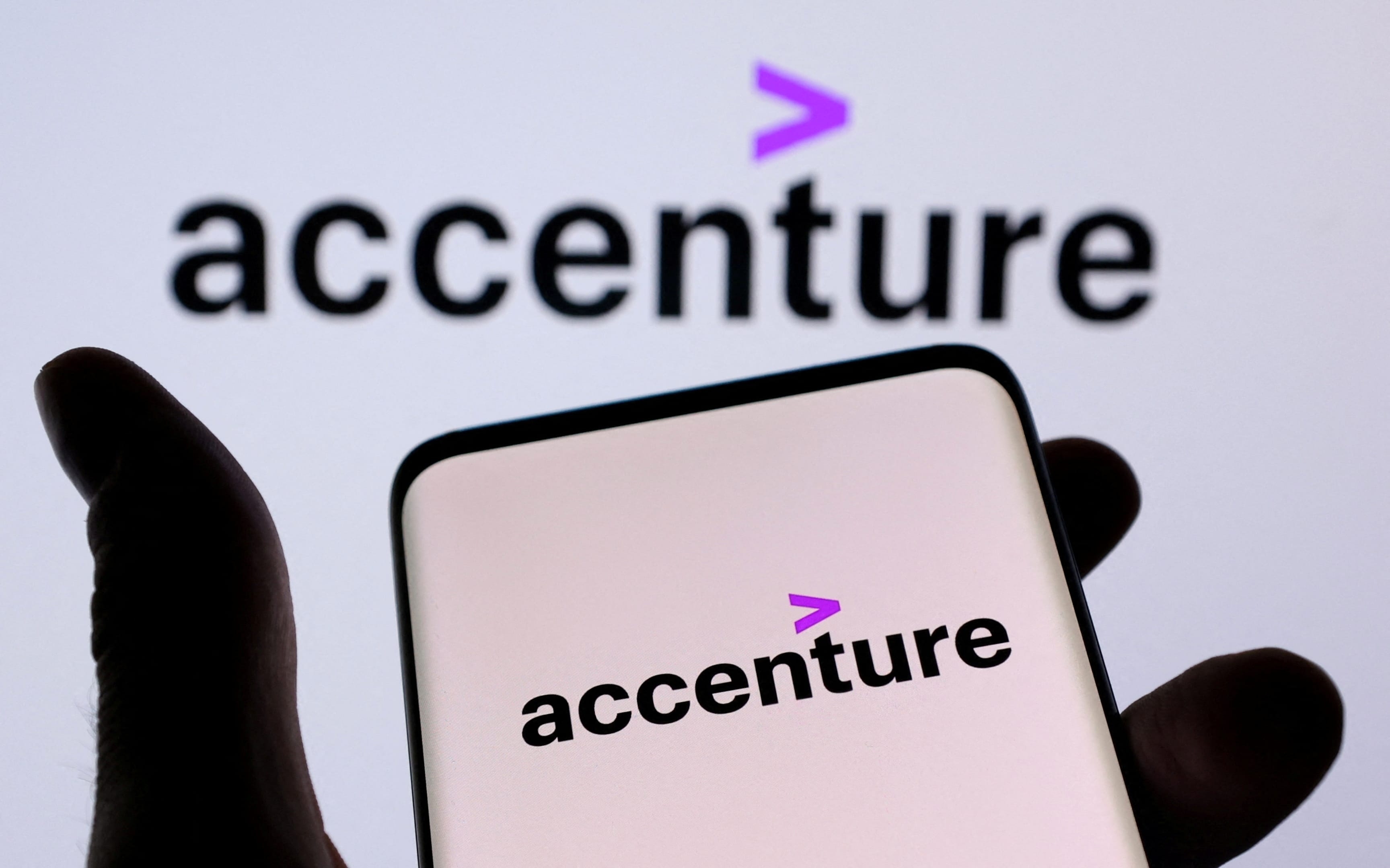Most experts believe that Accenture's double-digit growth is a positive for the Indian IT sector. Its commentary suggests that the demand environment remains supportive, they added. REUTERS/Dado Ruvic/Illustration/File Photo