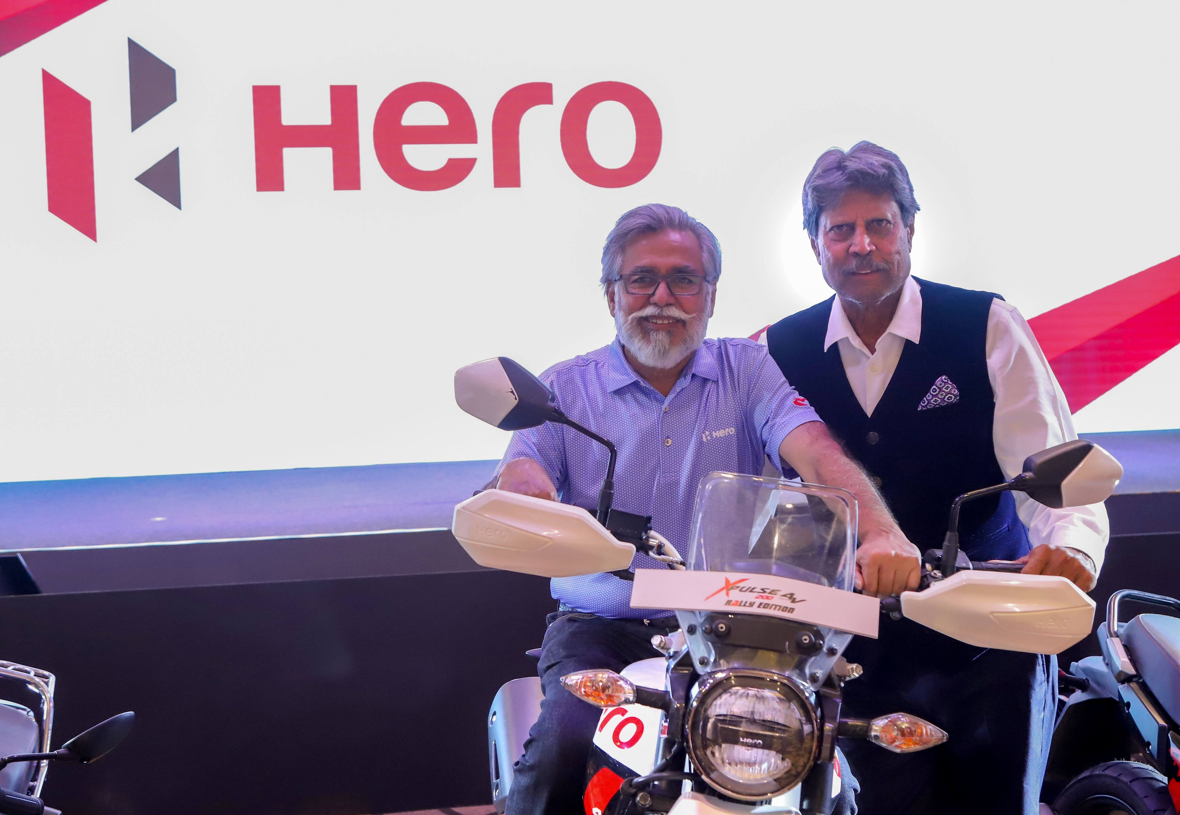 Hero Motocorp: The brokerage has a 'buy' call on the stock with a target at  <span class='webrupee'>₹</span>2,825 per share. It expects the stock to gradually recover its lost market share in motorcycles over the next 2-3 years, led by a gradual picking up of the economy, which would drive consumption from the mid-to-low income consumers and expectation of a revival in the rural economy. In the premium segment, the firm targets to double its market share to 10 percent in the coming years on the back of at least one launch a year over the next 3-4 years, added the brokerage. Market share revival in domestic motorcycles and ramp-up in exports are likely to be key upside triggers for the stock, said HDFC Sec. (PTI Photo) (PTI04_26_2022_000039B)