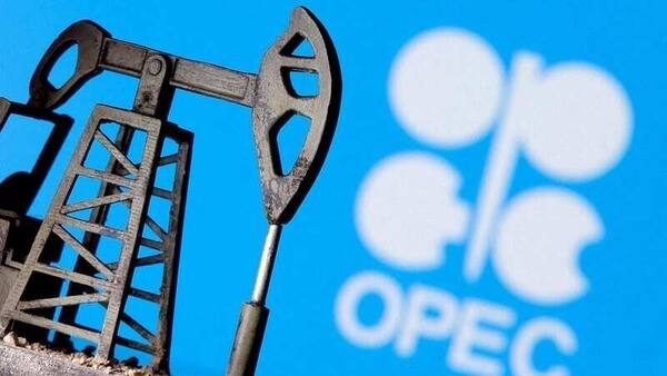 FILE PHOTO: A 3D-printed oil pump jack is seen in front of displayed OPEC logo in this illustration picture, April 14, 2020. REUTERS/Dado Ruvic/File Photo