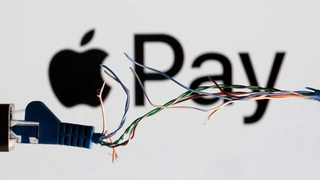 Broken Ethernet cable is seen in front of Apple Pay logo in this illustration taken March 11, 2022. REUTERS/Dado Ruvic/Illustration