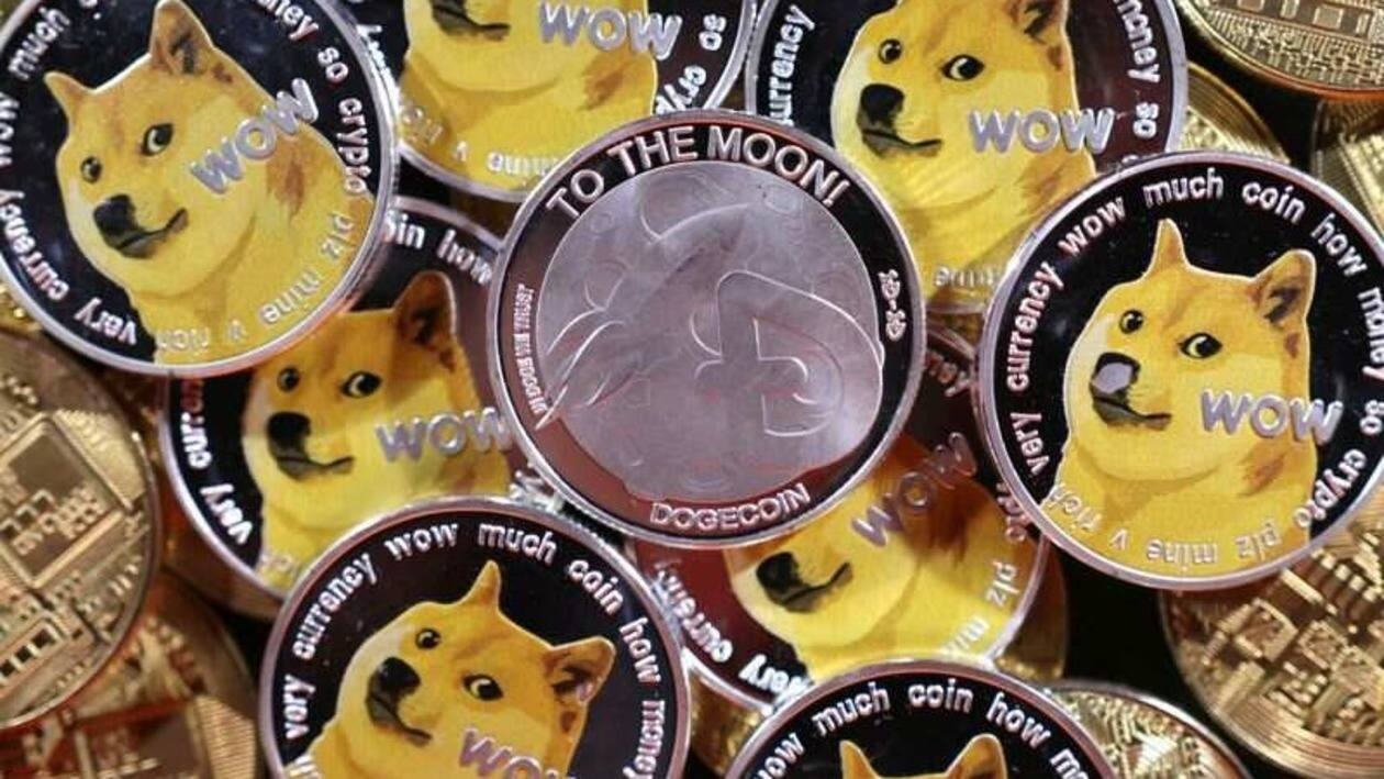 Representations of cryptocurrency Dogecoin are seen in this illustration taken June 16, 2022. REUTERS/Dado Ruvic/Illustration