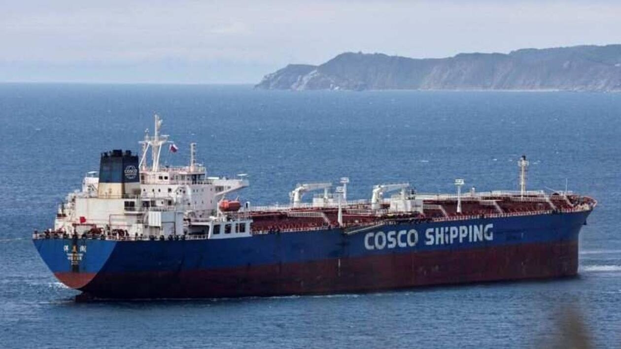 FILE PHOTO: Yang Mei Hu oil products tanker owned by COSCO Shipping gets moored at the crude oil terminal Kozmino on the shore of Nakhodka Bay near the port city of Nakhodka, Russia June 13, 2022. REUTERS/Tatiana Meel