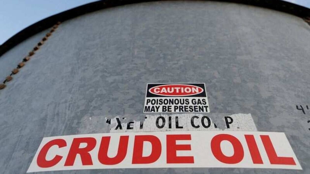 FILE PHOTO: A sticker reads crude oil on the side of a storage tank in the Permian Basin in Mentone, Loving County, Texas, U.S. November 22, 2019. Picture taken November 22, 2019.   REUTERS/Angus Mordant/