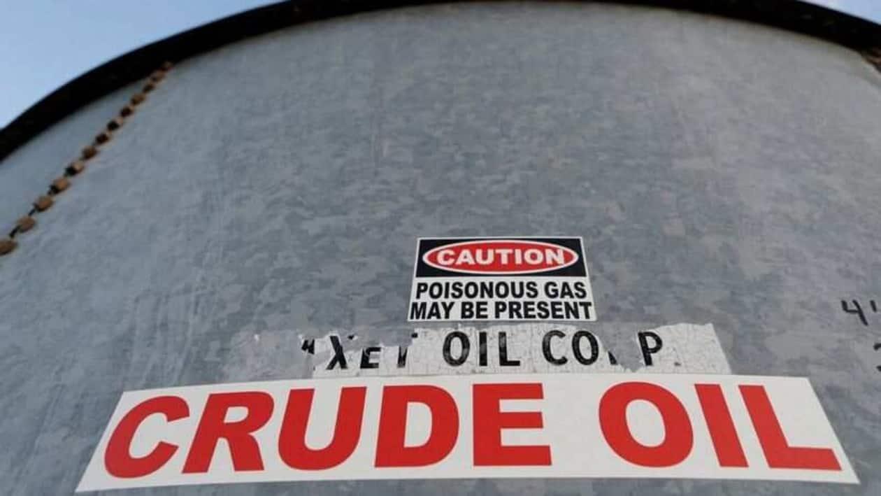 FILE PHOTO: A sticker reads crude oil on the side of a storage tank in the Permian Basin in Mentone, Loving County, Texas, U.S. November 22, 2019. Picture taken November 22, 2019.   REUTERS/Angus Mordant/