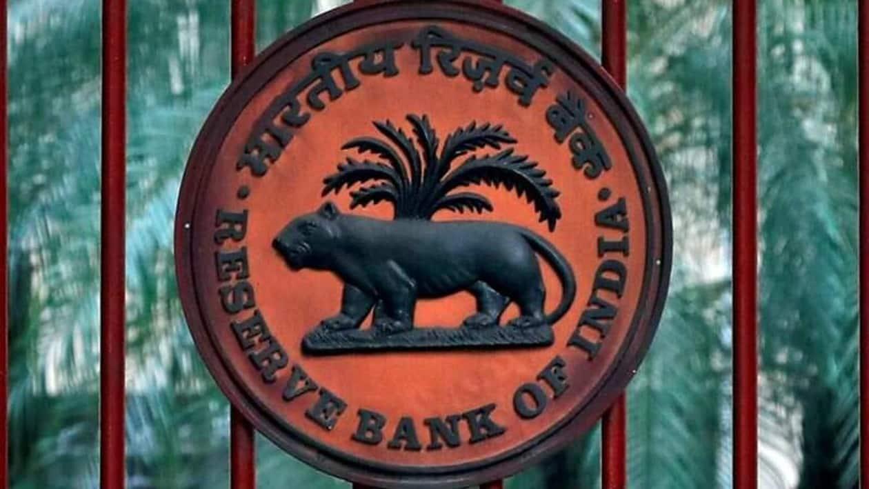 FILE PHOTO: A Reserve Bank of India (RBI) logo is seen at the gate of its office in New Delhi, India, November 9, 2018. REUTERS/Altaf Hussain