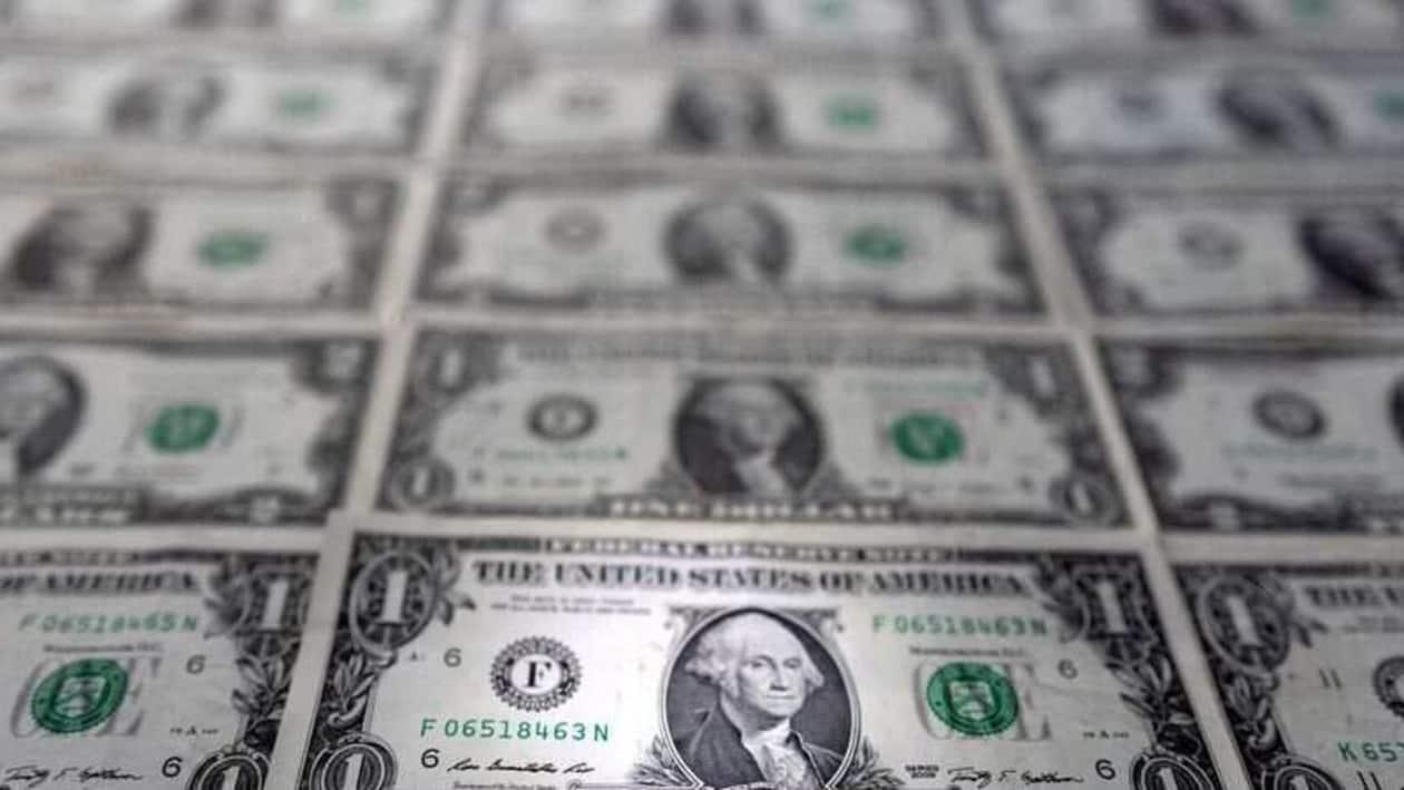 FILE PHOTO: U.S. dollar banknotes are displayed in this illustration taken, February 14, 2022. REUTERS/Dado Ruvic/File Photo