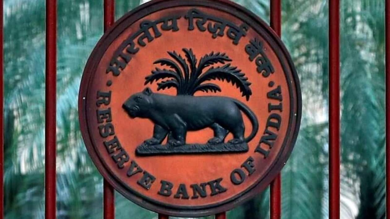 FILE PHOTO: A Reserve Bank of India (RBI) logo is seen at the gate of its office in New Delhi, India, November 9, 2018. REUTERS/Altaf Hussain/