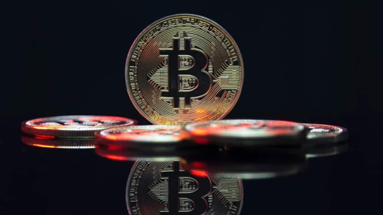 Bitcoin break above $22,000; Ether spikes 10%