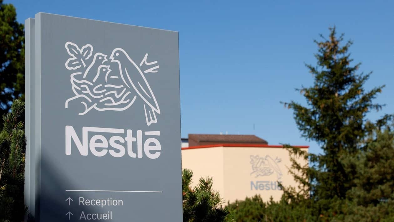 FILE PHOTO: A logo is pictured on the Nestle research center at Vers-chez-les-Blanc in Lausanne, Switzerland August 20, 2020. REUTERS/Denis Balibouse/File Photo  GLOBAL BUSINESS WEEK AHEAD