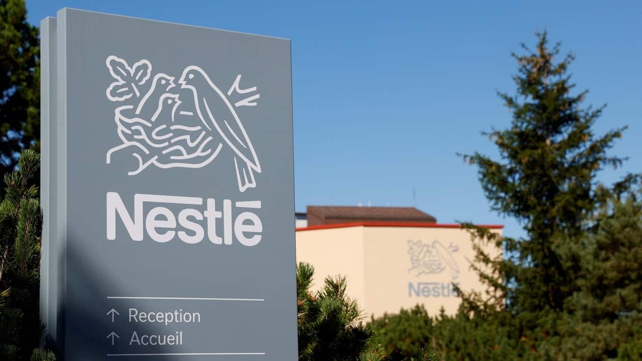 FILE PHOTO: A logo is pictured on the Nestle research center at Vers-chez-les-Blanc in Lausanne, Switzerland August 20, 2020. REUTERS/Denis Balibouse/File Photo  GLOBAL BUSINESS WEEK AHEAD