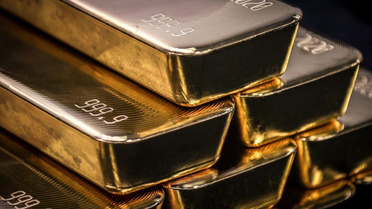 (FILES) This file photo taken on August 5, 2020 shows gold bullion bars after being inspected and polished at the ABC Refinery in Sydney. (Photo by DAVID GRAY / AFP)
