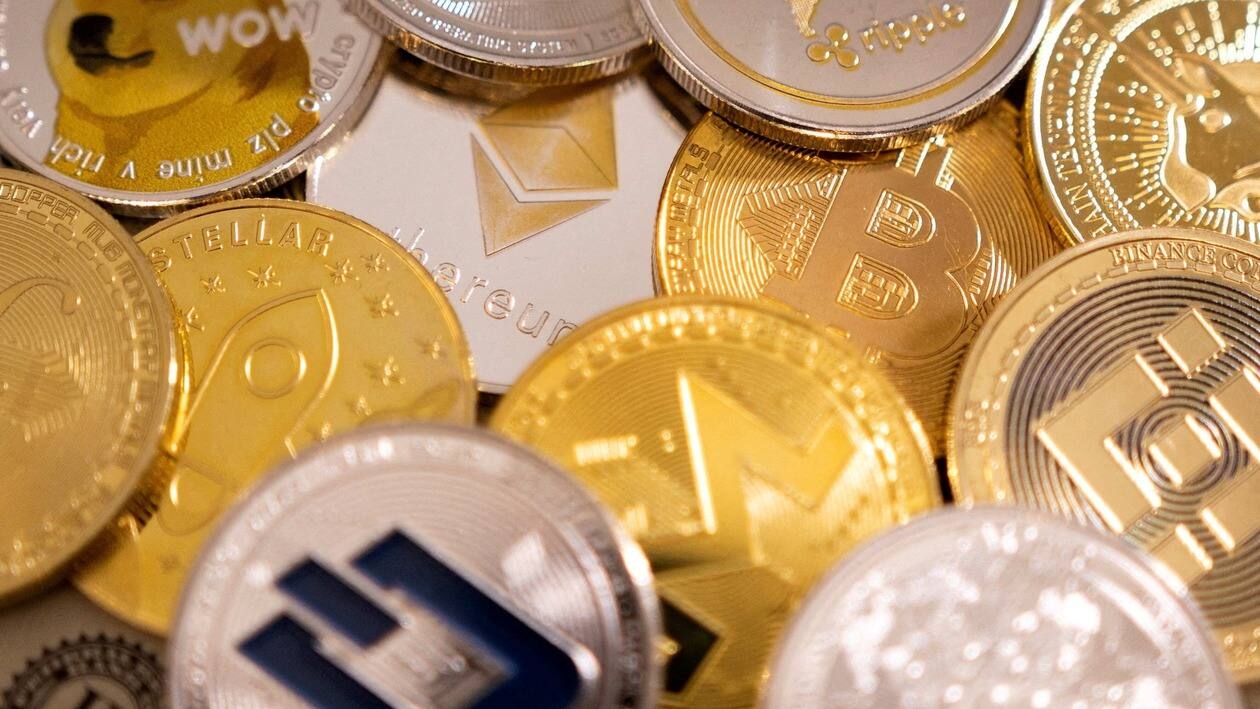 FILE PHOTO: Representations of cryptocurrencies in this illustration taken January 24, 2022. REUTERS/Dado Ruvic/Illustration/File Photo