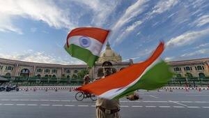 Indian flags in front of the Uttar Pradesh state legislature building during preparations for Independence Day celebrations.