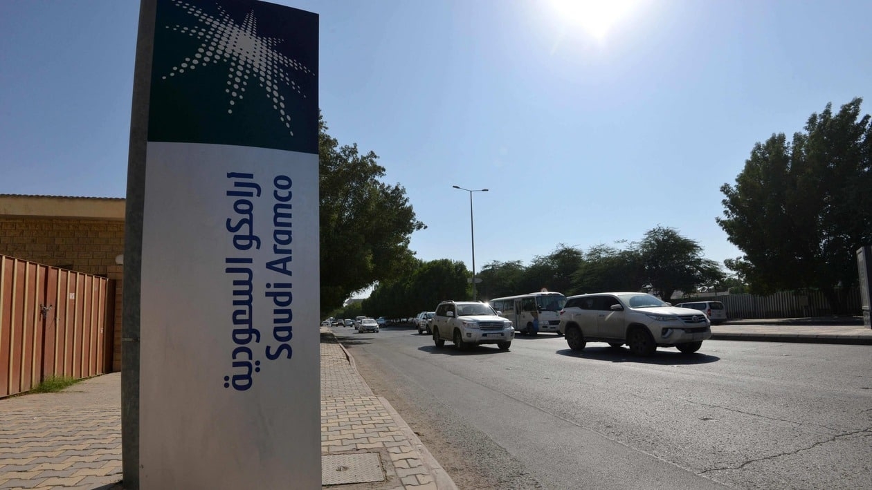 (FILES) In this file photo taken on December 5, 2019, a sign indicates the Saudi Aramco in front of the company's offices in the Saudi capital Ryadh. - Oil giant Saudi Aramco unveiled record profits of $48.4 billion in the second quarter on Sunday after Russia's war in Ukraine and a post-pandemic surge in demand sent crude prices soaring. (Photo by FAYEZ NURELDINE / AFP)