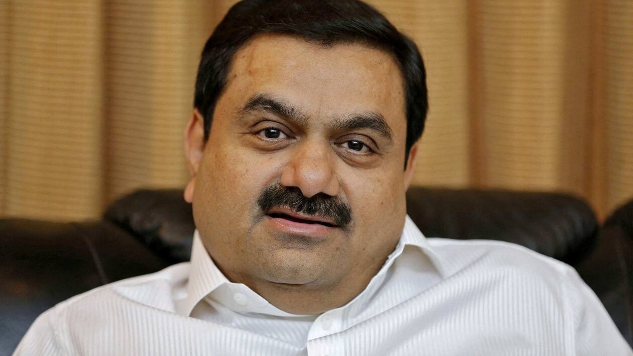 FILE PHOTO: Indian billionaire Gautam Adani speaks during an interview with Reuters at his office in the western Indian city of Ahmedabad in this April 2, 2014 file photo.    REUTERS/Amit Dave/File Photo