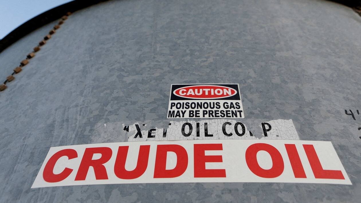 FILE PHOTO: A sticker reads crude oil on the side of a storage tank in the Permian Basin in Mentone, Loving County, Texas, U.S. November 22, 2019. Picture taken November 22, 2019.   REUTERS/Angus Mordant/File Photo