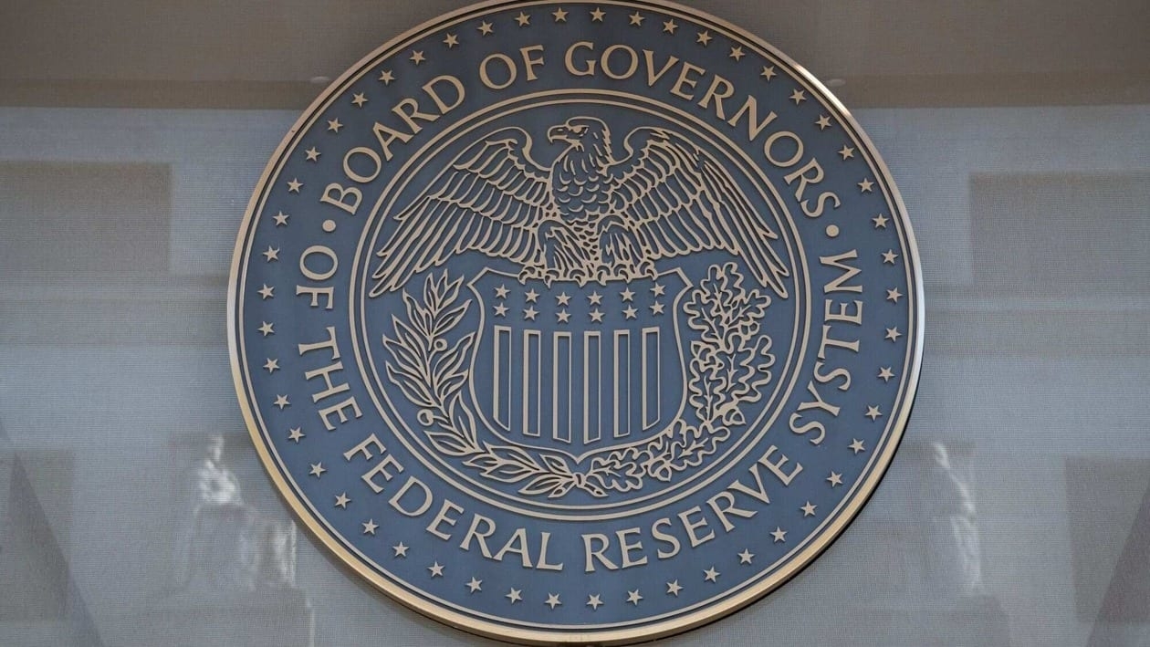 The seal of the US Federal Reserve Board of Governors near the Marriner S. Eccles Federal Reserve building in Washington, D.C., US, on Tuesday, Aug. 23, 2022. The Federal Reserve chair's speech this week at the Jackson Hole symposium is expected to offer clues on the Fed's tightening path, with hedge funds making record bets that the US central bank will stick to its hawkish script. Photographer: Graeme Sloan/Bloomberg