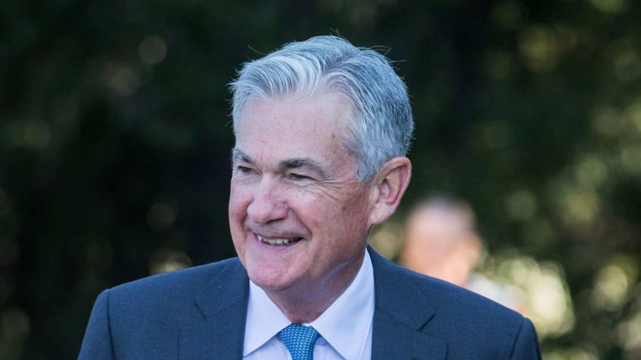 Federal Reserve Chair Jerome Powell smiles and walks after his speech at the central bank's annual symposium at Jackson Lake Lodge in Grand Teton National Park Friday, Aug. 26, 2022. in Moran, Wyo. (AP Photo/Amber Baesler)