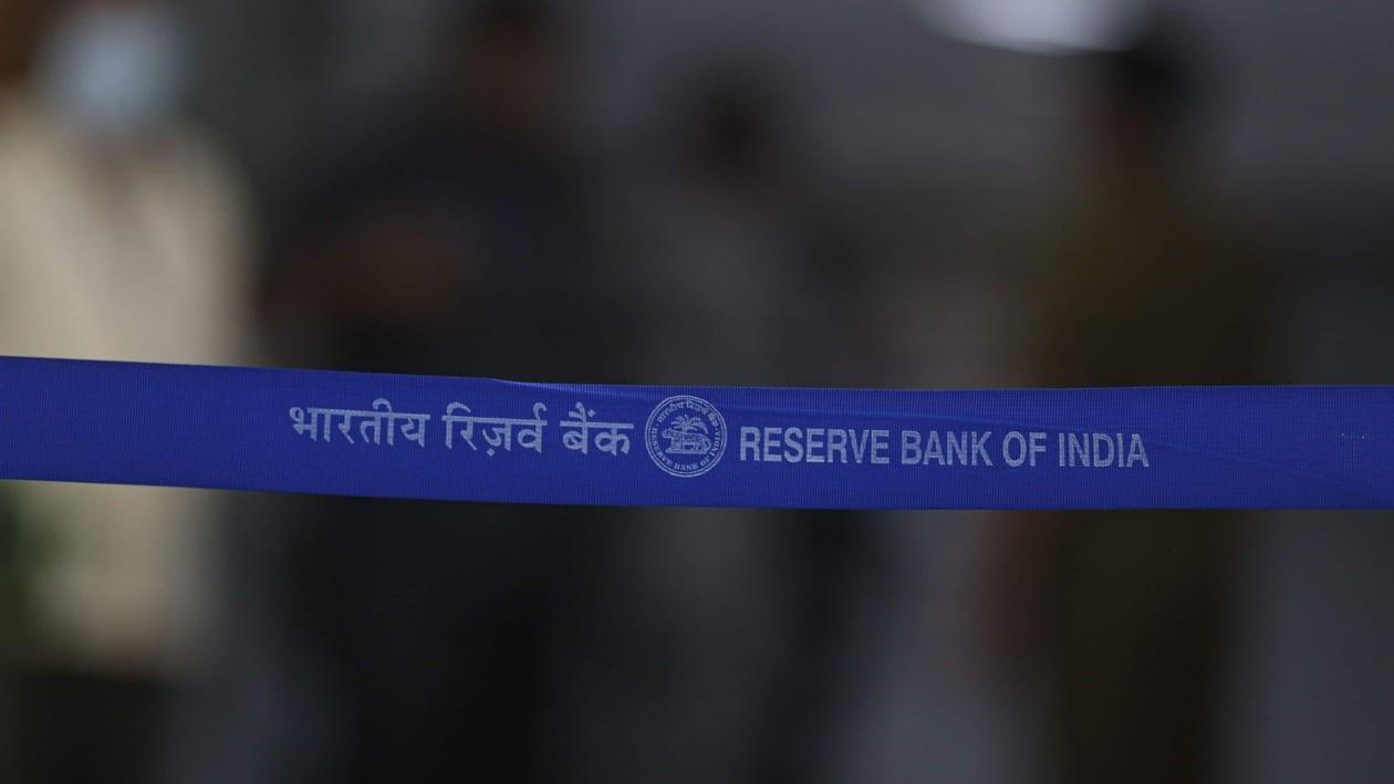 The logo of the Reserve Bank of India (RBI) on a belt at their headquarters in Mumbai, India, on Friday, April 8, 2022. India�s central bank signaled a shift in policy focus as it ramped up efforts to mop up excess liquidity in the banking system and raised its inflation forecasts, sending bond yields higher. Photographer: Dhiraj Singh/Bloomberg