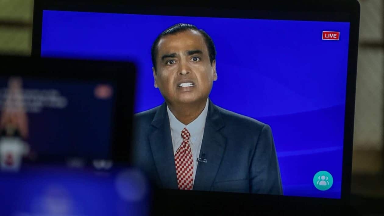 Mukesh Ambani, chairman and managing director of the Reliance Industries Ltd., speaks via live stream during the annual general meeting in Mumbai, India, on Monday, Aug. 29, 2022. Reliance will invest 2 trillion rupees ($25 billion) to roll out its 5G services in October across the largest Indian cities, its billionaire-chairman�Mukesh Ambani�said as he continues to expand and diversify the $221 billion empire. Photographer: Dhiraj Singh/Bloomberg