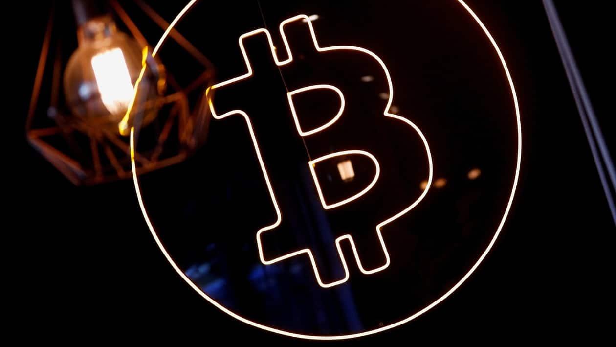 FILE PHOTO: A neon logo of cryptocurrency Bitcoin is seen at the Crypstation cafe, in downtown Buenos Aires, Argentina May 5, 2022. Picture taken May 5, 2022. REUTERS/Agustin Marcarian/File Photo