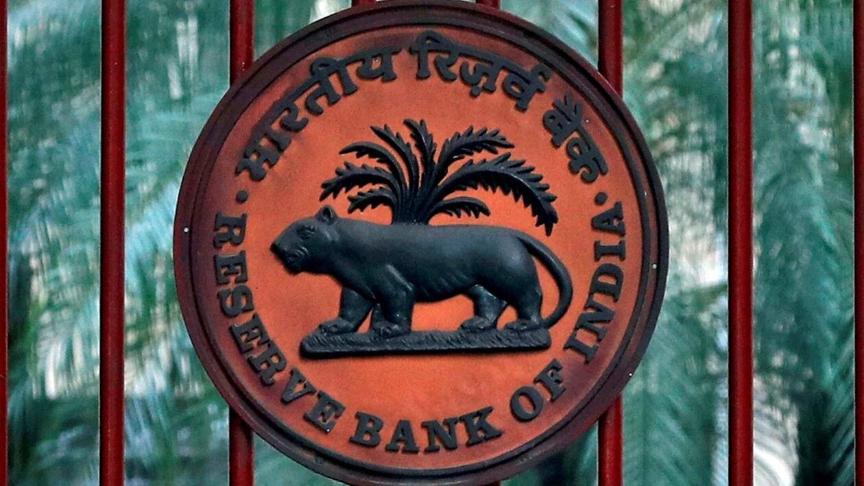 FILE PHOTO: A Reserve Bank of India (RBI) logo is seen at the gate of its office in New Delhi, India, November 9, 2018. REUTERS/Altaf Hussain/File Photo