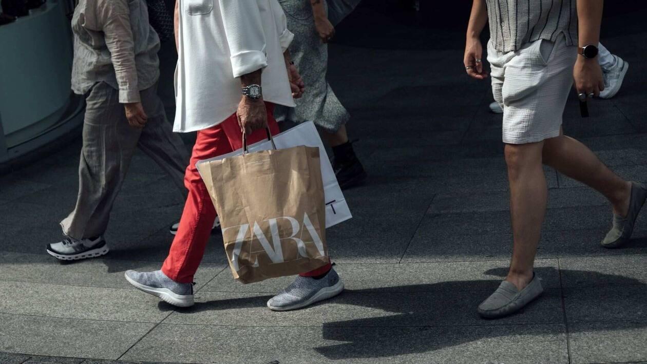 A shopper carries a Zara-branded bag in the old town area of Brussels, Belgium, on Monday, Aug. 29, 2022. Belgian inflation hit a 46-Year high of 9.94% as the cost of natural gas more than doubled. Photographer: Cyril Marcilhacy/Bloomberg