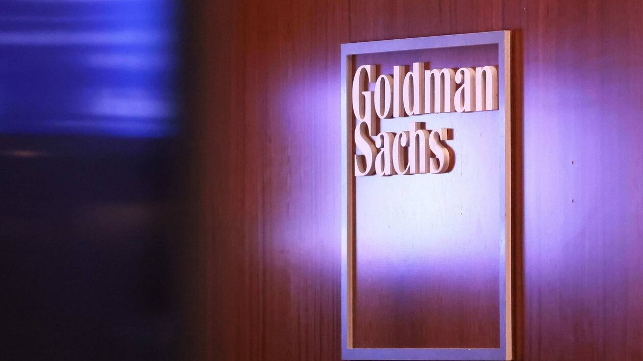 NEW YORK, NEW YORK - SEPTEMBER 13: The Goldman Sachs logo is seen on at the New York Stock Exchange on September 13, 2022 in New York City. Goldman Sachs announced today a plan to cut several hundred jobs this month, making it the first Wall Street firm to take steps to cut down on expenses amid a drop in volume of deals after pausing layoffs for two years during the coronavirus (COVID-19) pandemic.   Michael M. Santiago/Getty Images/AFP