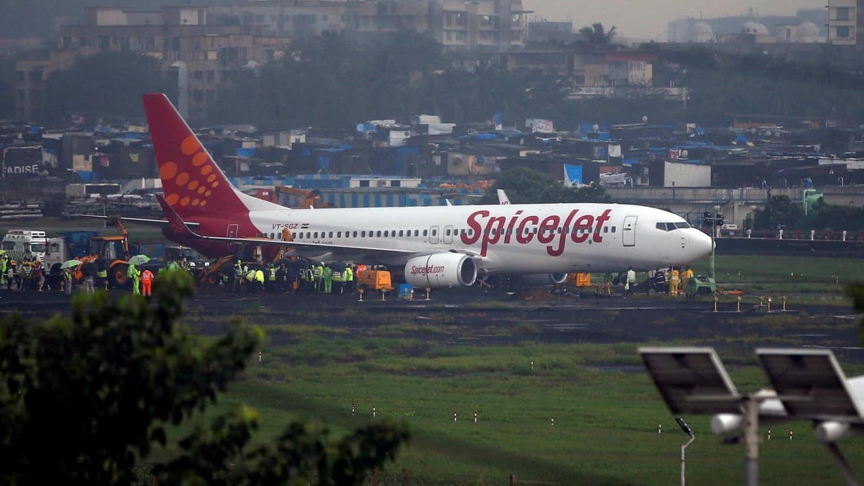 FILE PHOTO: A SpiceJet passenger aircraft Boeing 737-800 is seen after it overshoot the runway while landing on Tuesday night at the airport in Mumbai, India, September 20, 2017. REUTERS/Shailesh Andrade/File Photo