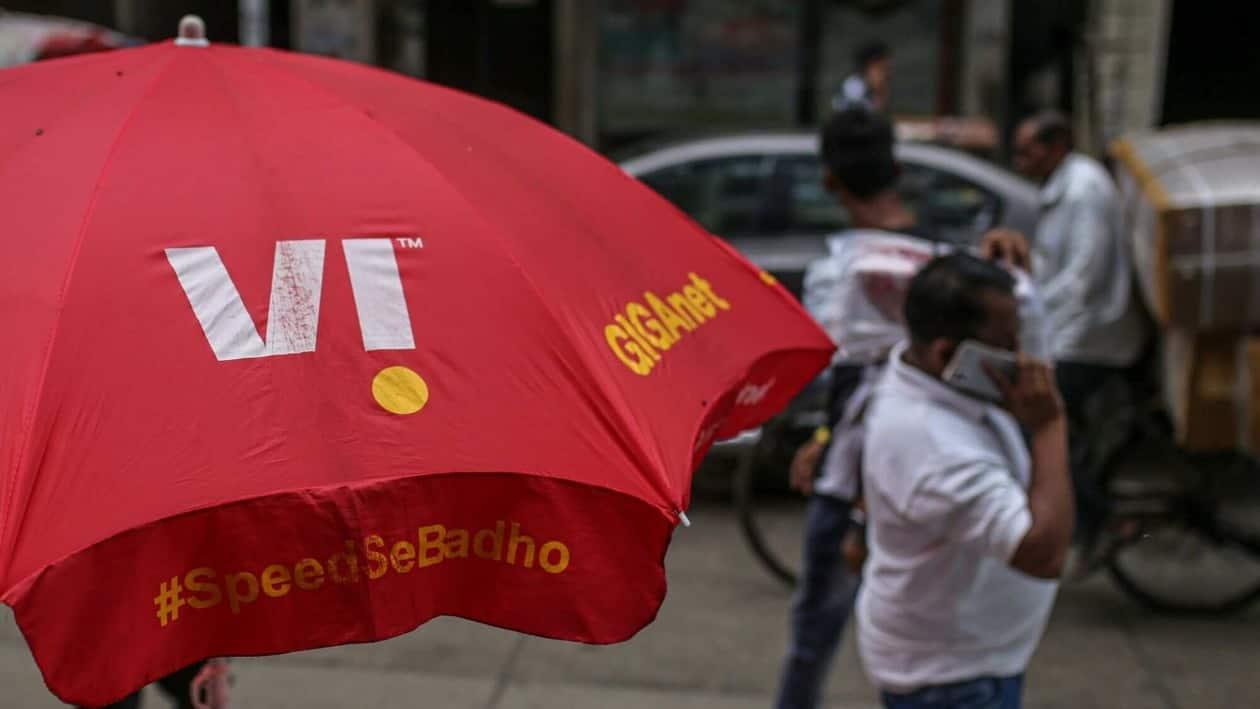 An signage of Vodafone Idea Ltd., on an umbrella in Mumbai, India, on Wednesday, Aug. 3, 2022. The South Asian nation sold spectrum, including 5G airwaves, worth 1.5 trillion rupees ($19 billion) across multiple bands, India�s telecom minister�Ashwini Vaishnaw�told reporters in New Delhi on Monday, confirming the government�s forecast of a�record�collection. Photographer: Dhiraj Singh/Bloomberg
