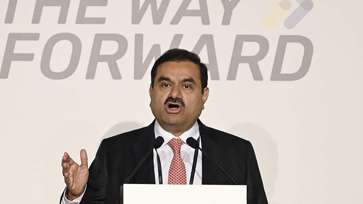 Gautam Adani, chairman of Adani Group speaks during the Forbes CEO Summit in Singapore, on Tuesday, Sept. 27, 2022. Adani said, getting rid of all fossil fuels instantly would not work for India, in his speech. Photographer: Edwin Koo/Bloomberg