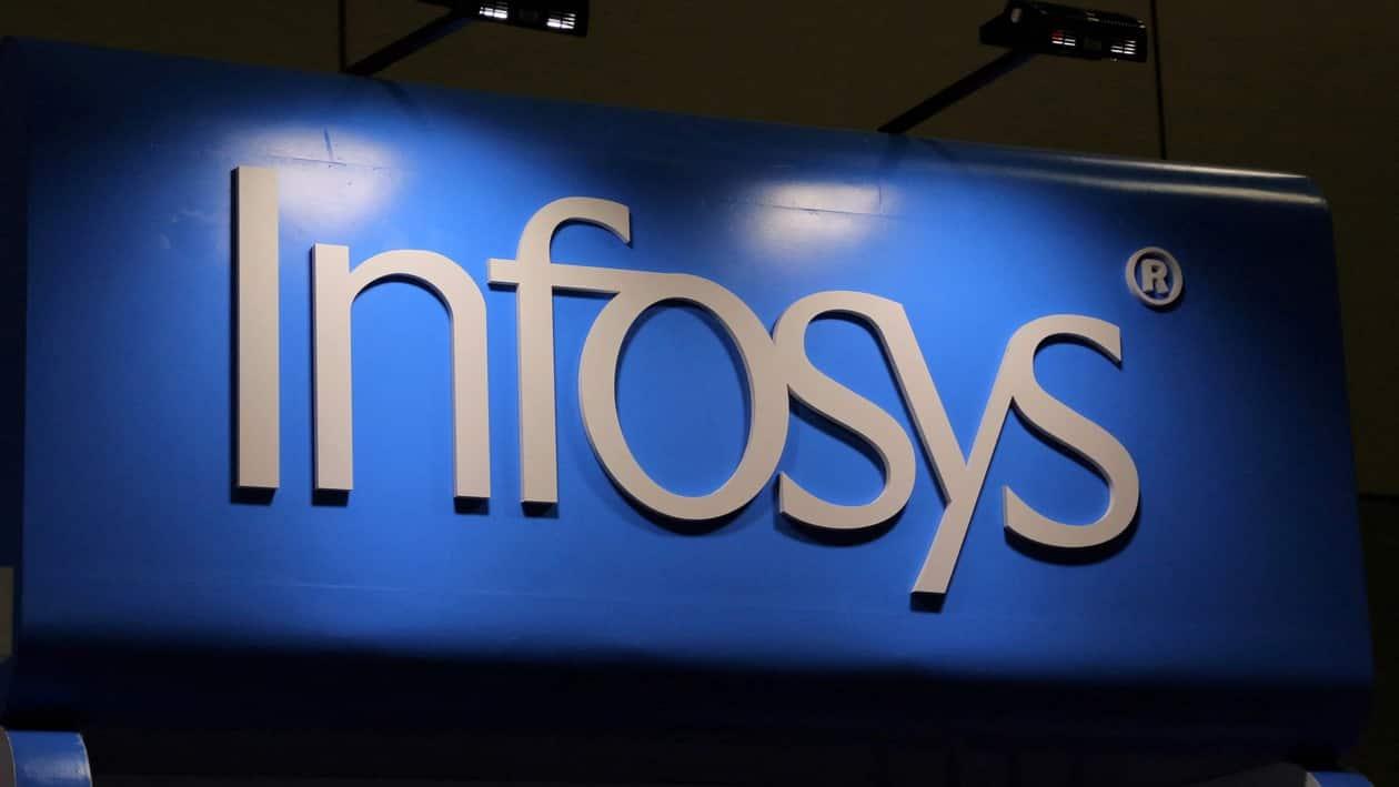 FILE PHOTO: FILE PHOTO: The Infosys logo is seen at the SIBOS banking and financial conference in Toronto, Ontario, Canada October 19, 2017. REUTERS/Chris Helgren/File Photo