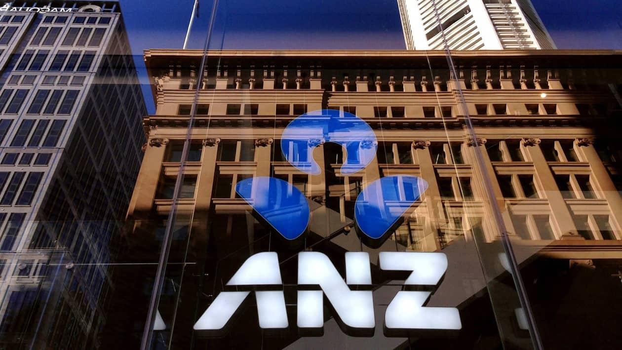FILE PHOTO: FILE PHOTO: The logo of the ANZ Banking Group is displayed in the window of a branch in central Sydney, Australia, Aprl 30, 2016.  REUTERS/David Gray/File Photo/File Photo