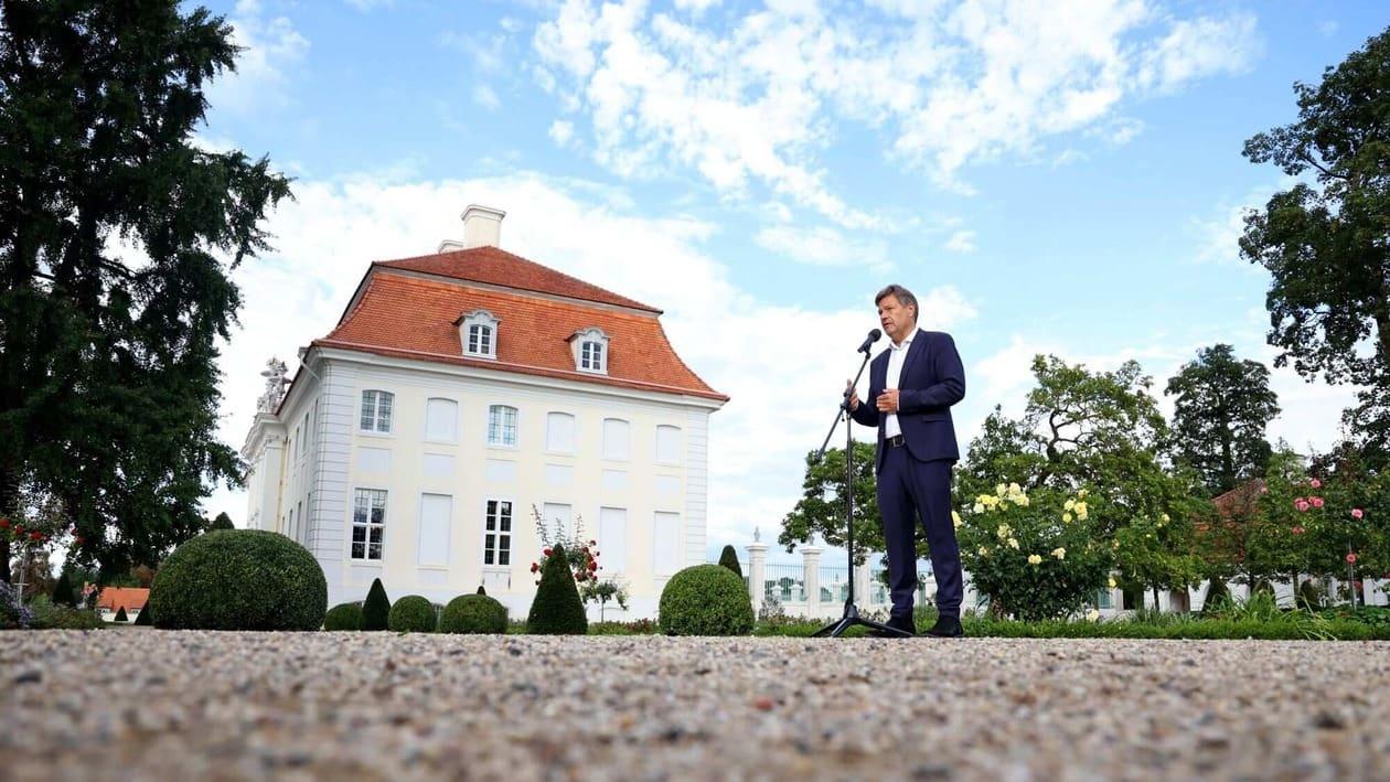Robert Habeck, Germany's economy and climate minister, delivers a statement during the opening day of a retreat at Meseberg Castle in Meseberg, Germany, on Tuesday, Aug. 30, 2022. Habeck said compensation for gas suppliers forced to pay higher prices due to Russia squeezing deliveries will not be paid to freeloading companies that don't need it to stay afloat. Photographer: Liesa Johannssen-Koppitz/Bloomberg