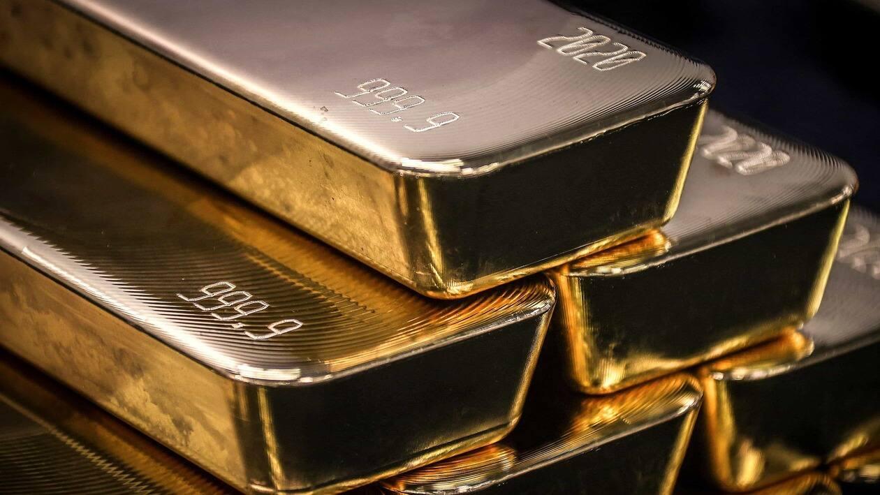 (FILES) This file photo taken on August 5, 2020 shows gold bullion bars after being inspected and polished at the ABC Refinery in Sydney. &nbsp;(Photo by DAVID GRAY / AFP)