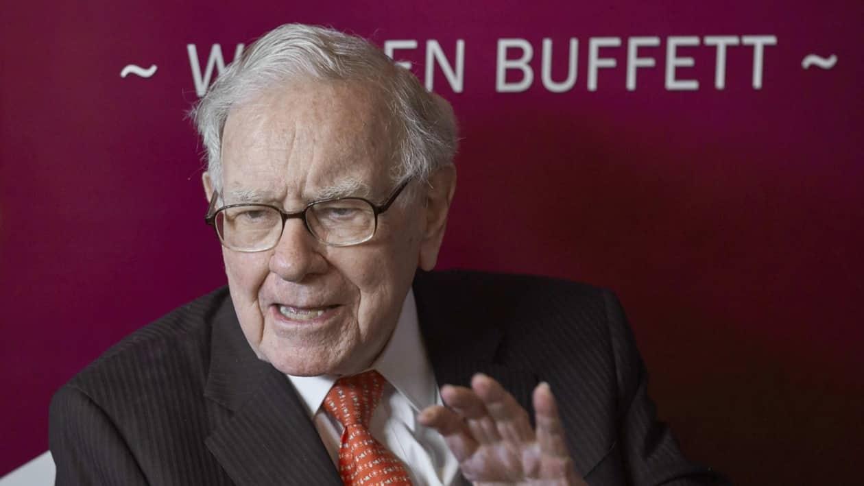 FILE - Warren Buffett, Chairman and CEO of Berkshire Hathaway, speaks during a game of bridge following the annual Berkshire Hathaway shareholders meeting on May 5, 2019, in Omaha, Neb. Buffett's company revealed that it had cut its holdings in U.S. Bank's parent company and in Chinese electric car maker BYD ahead of offering a full update on its stock portfolio Monday, Nov. 14, 2022. (AP Photo/Nati Harnik, File)