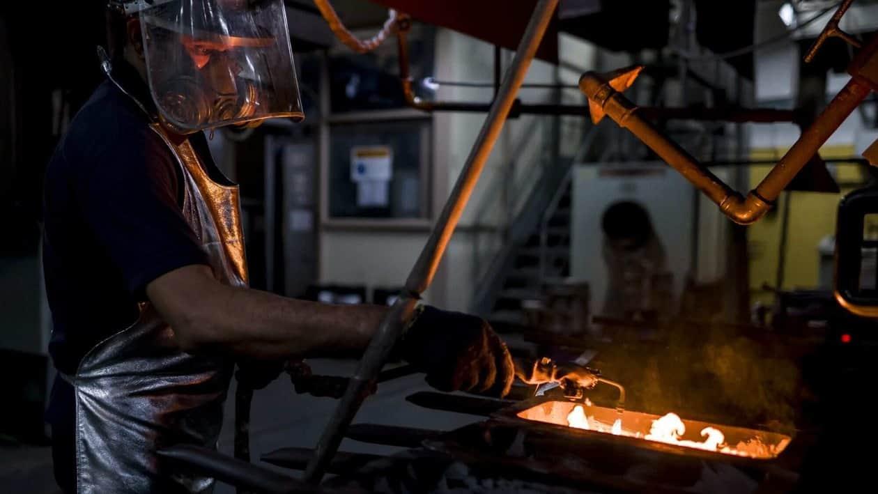 A worker prepares a gold bullion cast at a gold and silver refinery operated by MMTC-PAMP India Pvt. Ltd., in Nuh, India, on Wednesday, Aug. 31, 2022. Gold�held near its highest level in September 2022, as the dollar continued its retreat amid growing expectations that inflation may have peaked in the US. Photographer: Anindito Mukherjee/Bloomberg
