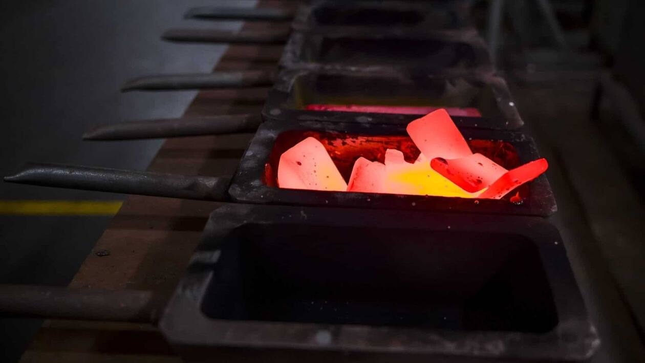 Raw gold bullion from a test sample are kept in a cast case near a furnace at a gold and silver refinery operated by MMTC-PAMP India Pvt. Ltd., in Nuh, India, on Wednesday, Aug. 31, 2022. Gold�held near its highest level in September 2022, as the dollar continued its retreat amid growing expectations that inflation may have peaked in the US. Photographer: Anindito Mukherjee/Bloomberg