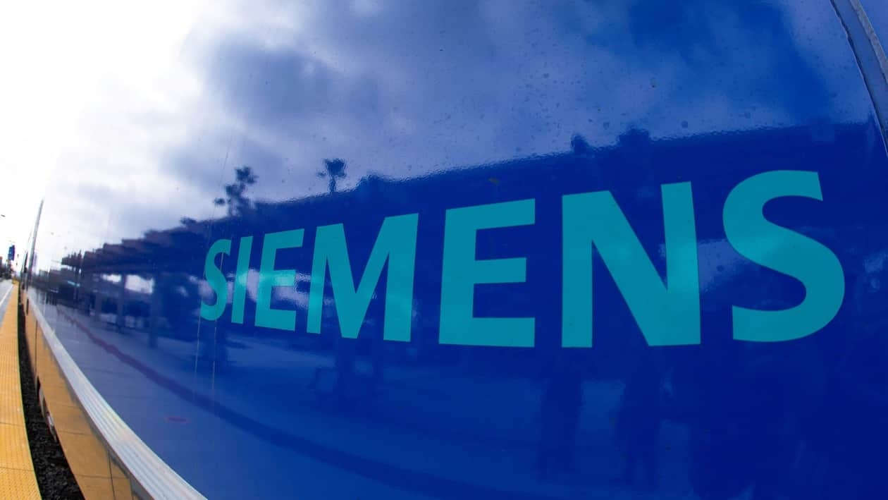 FILE PHOTO: The Siemens logo is shown on a new Siemens Charger locomotive as it comes into service as part of the Coaster Fleet in Oceanside, California, U.S., February 8, 2021. REUTERS/Mike Blake/File Photo