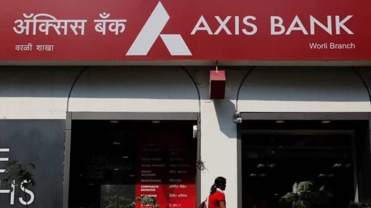 FILE PHOTO:  A customer enters a branch of Axis Bank in Mumbai, India, January 22, 2018. REUTERS/Danish Siddiqui/File photo