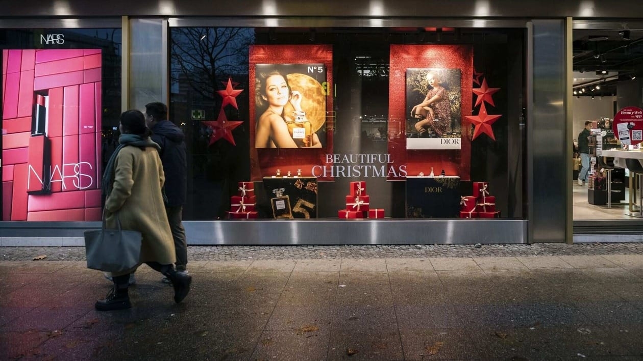 Festive decorations in a Dior window display at the KaDeWe department store on Kurfuerstendamm avenue in Berlin, Germany, on Tuesday, Dec. 20, 2022. Germany's business outlook improved for a third month amid signs that double-digit inflation may be peaking and a deep recession over the winter can be avoided. Photographer: Jacobia Dahm/Bloomberg