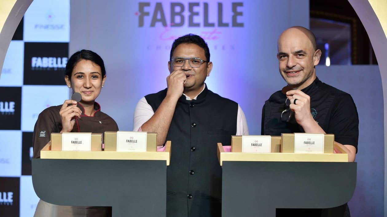 Mumbai, Oct 20 (ANI): Australian patissier and television presenter Adriano Zumbo (R), Chocolates, Confectionary and Coffee, Foods Division, ITC Ltd. Chief Operating Officer (COO) Anuj Rustagi (C) and Chef Ruby (L) unveiling the Fabelle Finesse by ITC Ltd.’s Fabelle Exquisite Chocolates, in Mumbai recently. (ANI Photo)