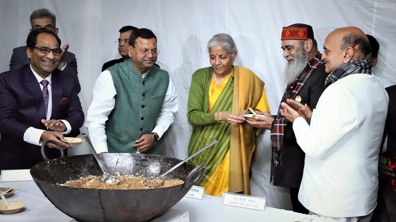 New Delhi, Jan 26 (ANI): Union Finance Minister Nirmala Sitharaman ,Union Minister of State for Finance Bhagwat Kishanrao Karad, Union Minister of State for Finance Pankaj Chaudhary and others during the Halwa Ceremony ahead of the Lock in process of the Budget preparation, in New Delhi on Thursday. (ANI Photo)