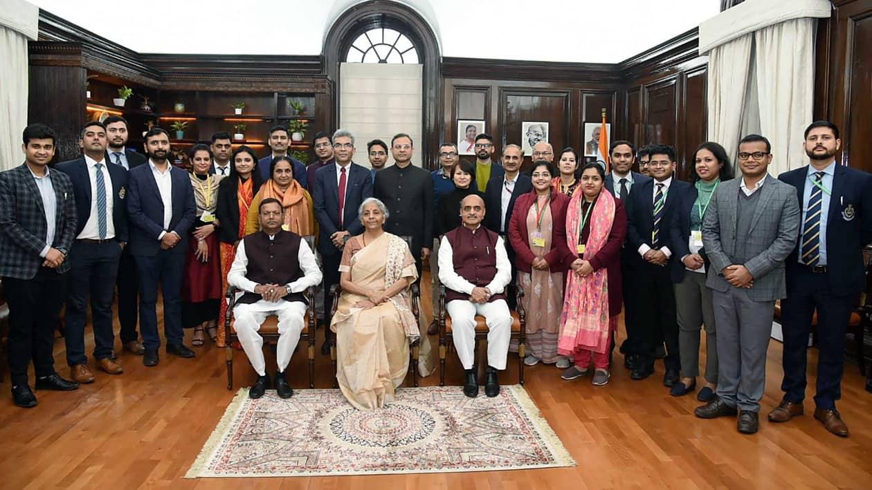 Union Finance Minister Nirmala Sitharaman, Union Ministers of State for Finance Bhagwat Kishanrao Karad, Pankaj Chaudhary and others pose for a group photo during the Final Touch meeting of the Union Budget 2023. (ANI Photo)