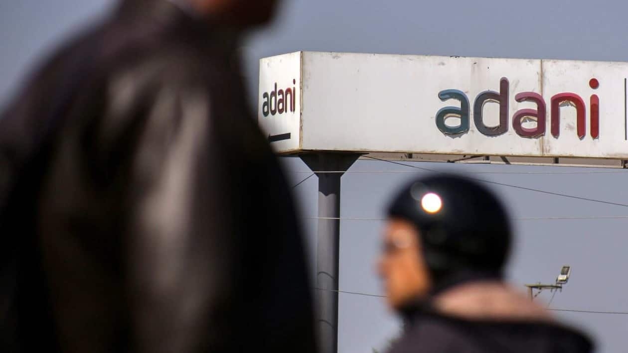 Signage atop the Adani Group headquarters in Ahmedabad, India, on Wednesday, Feb. 1, 2023. The crisis of confidence plaguing Gautam Adani is deepening, with the stock rout triggered by Hindenburg Research's fraud allegations erasing a third of the market value in his group�s companies despite the completion of a key share sale. Photographer: Dhiraj Singh/Bloomberg