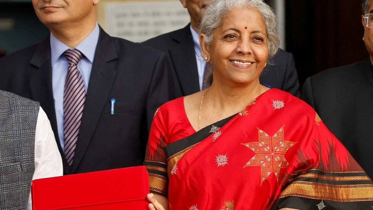 India's Finance Minister Nirmala Sitharaman holds up a folder with the Government of India's logo as she leaves her office to present the federal budget in the parliament, in New Delhi, India, February 1, 2023. REUTERS/Adnan Abidi